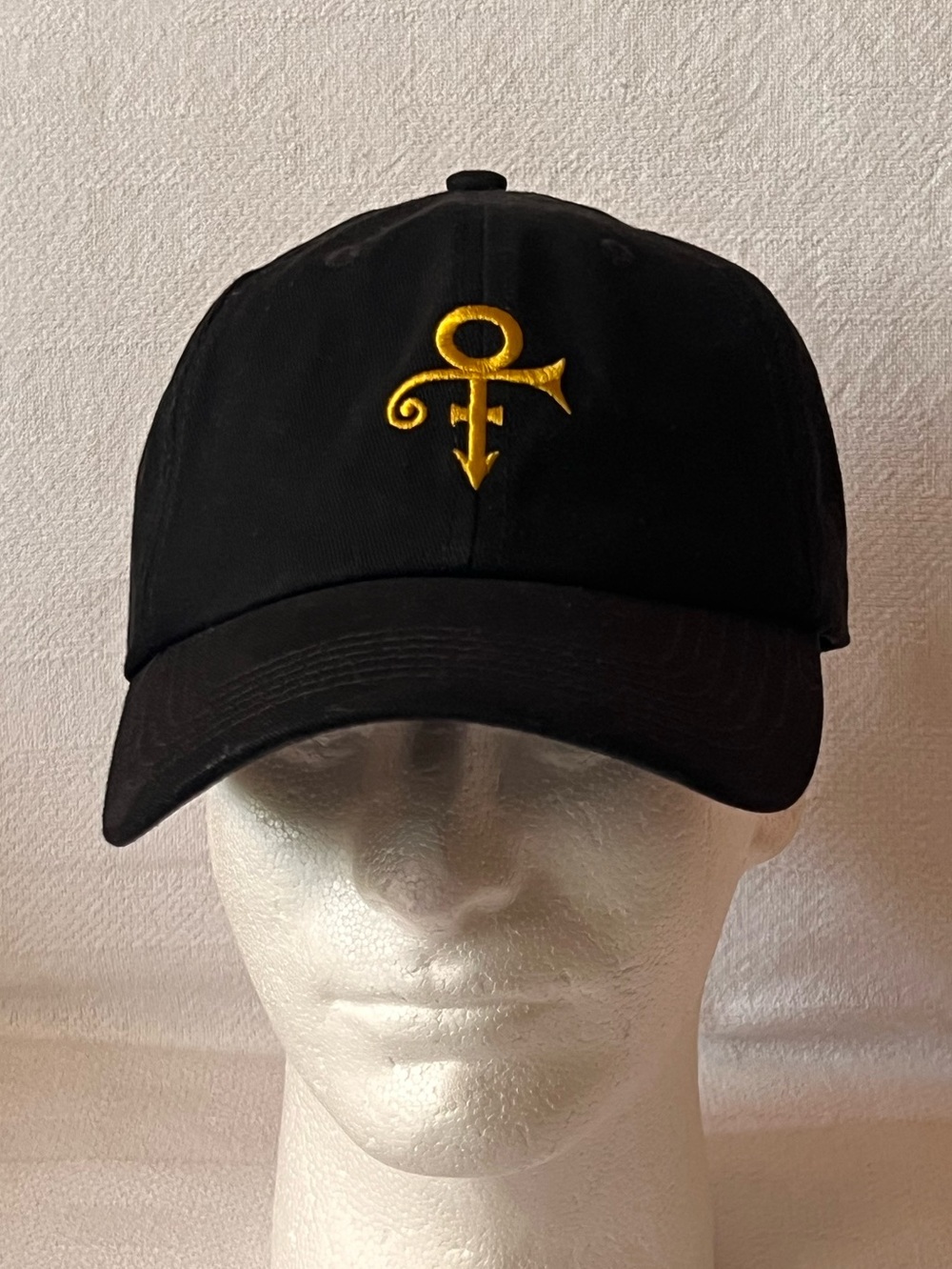 Black Cap with Gold Prince Symbol Embroidery